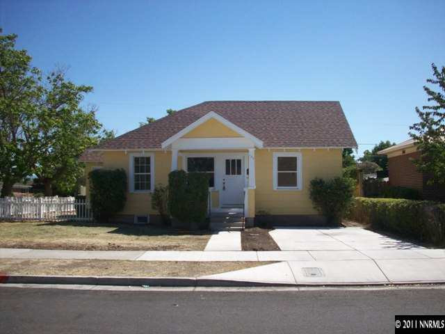 790 Roberts Street Reno, NV 89502 - Photo 1 of 9 a front view of a house with a garden