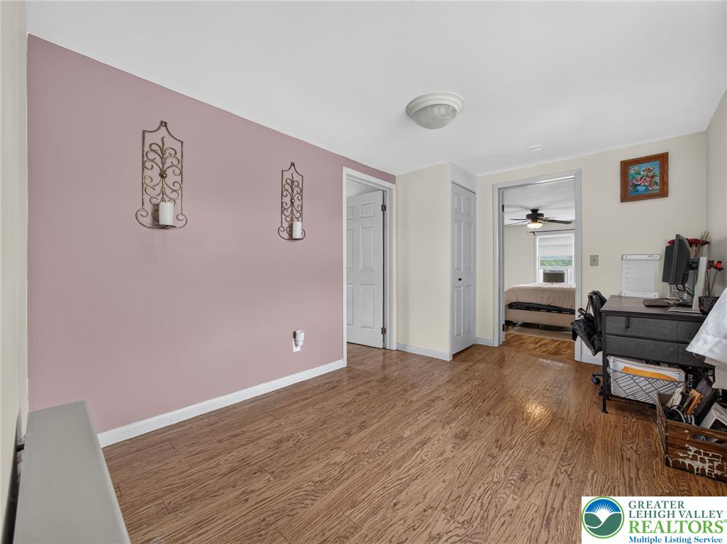 2628 Levans Road Coplay, PA 18037 - Photo 41 of 54 Rich hardwood floors flow seamlessly through this versatile interior space, connecting to other rooms.
