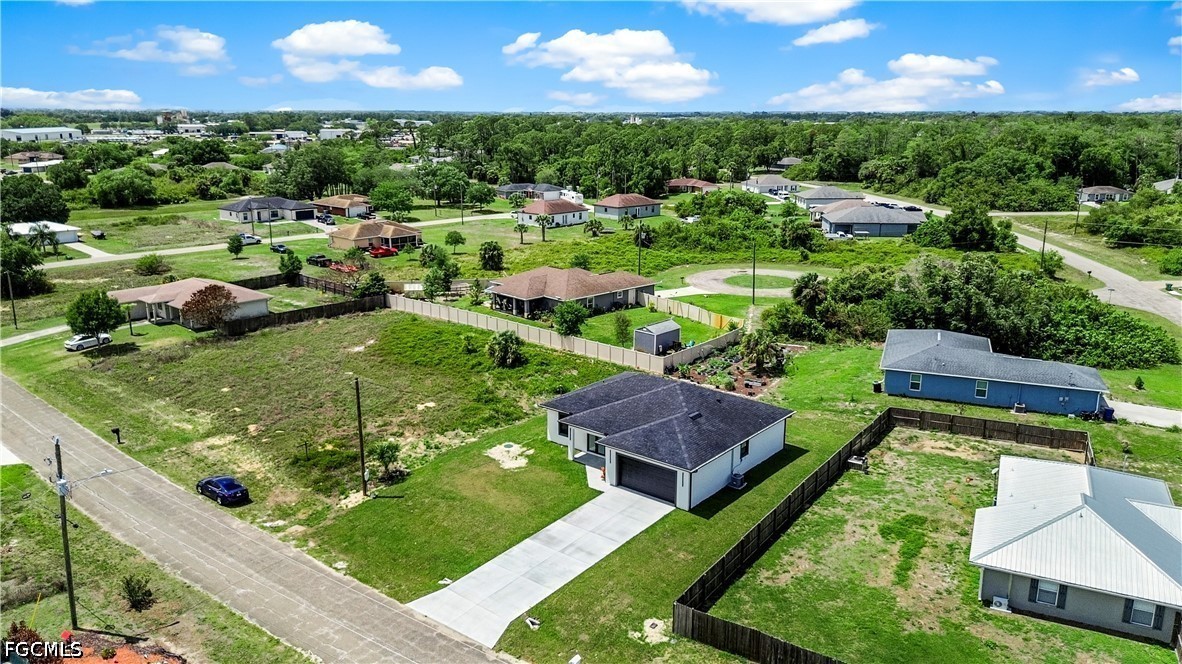 3004 South Tulip Road LaBelle, FL 33935 - Photo 6 of 24 a view of a garden with an outdoor space