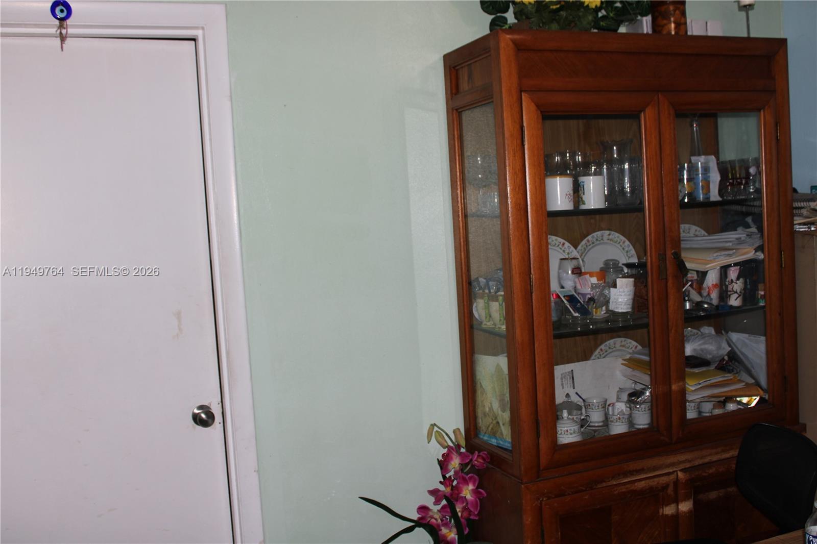 1154 West 35th Street, Unit 221 Hialeah, FL 33012 - Photo 25 of 39 a view of a hallway with closet