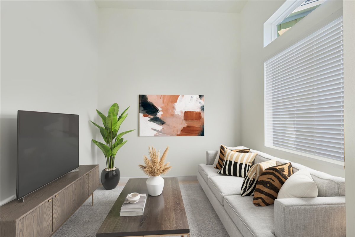 8922 Manchaca Road, Unit 906 Austin, TX 78748 - Photo 5 of 29 a view of a living room and a couch in a livingroom
