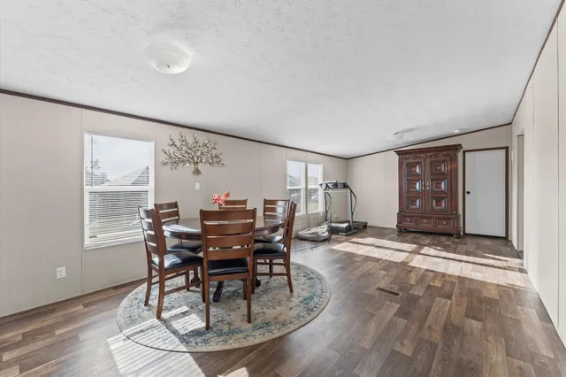 a view of a livingroom with furniture and window