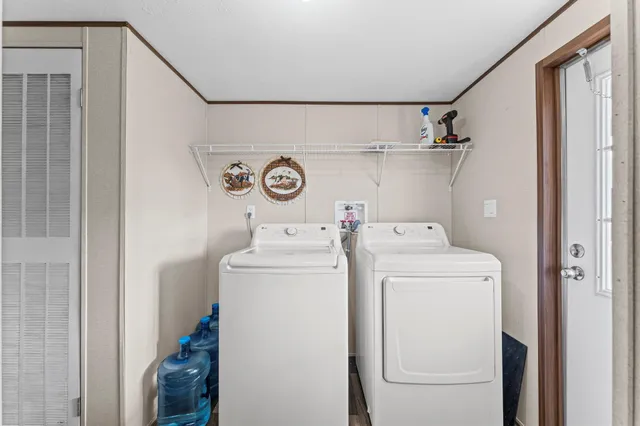 a view of an house with backyard and porch