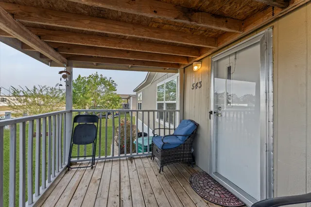 an aerial view of houses with outdoor space