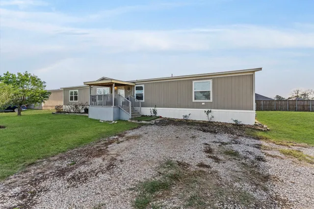 a picture of a bathroom with a window