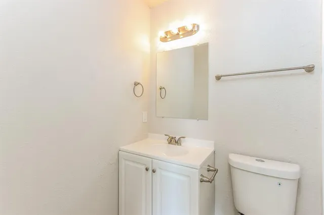 a bathroom with a sink and a toilet