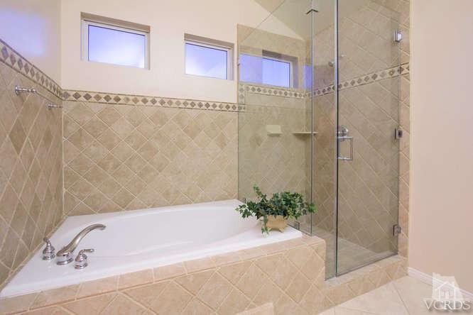 2480 Rutland Place Thousand Oaks, CA 91362 - Photo 11 of 23 a bathroom with a bathtub and a shower