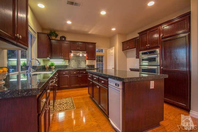2480 Rutland Place Thousand Oaks, CA 91362 - Photo 4 of 23 a kitchen with stainless steel appliances granite countertop a stove and a refrigerator