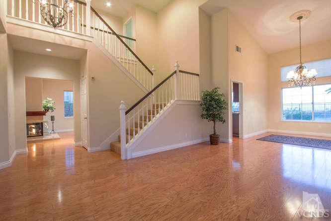 2480 Rutland Place Thousand Oaks, CA 91362 - Photo 9 of 23 a view of a hallway with wooden floor and entryway