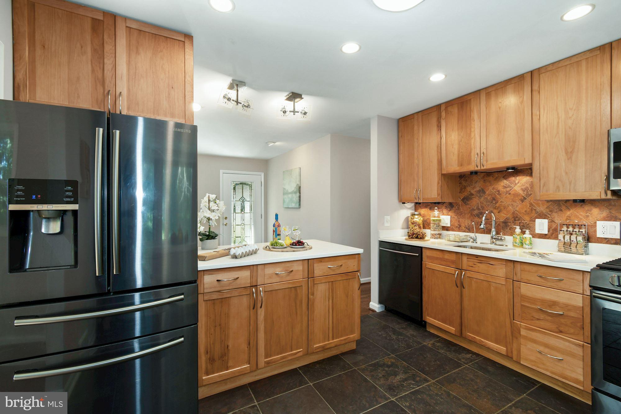 7922 East Rockglen Court Springfield, VA 22152 - Photo 9 of 38 Gourmet Kitchen/Black Stainless Steel Appliances