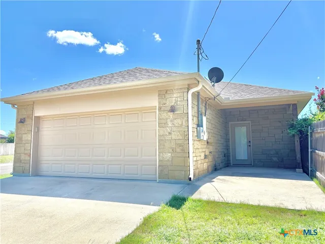 a view of a entryway door front of house