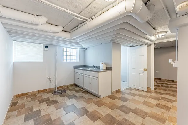 a bedroom with a bed and a cabinets