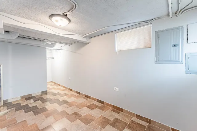 a view of a big room with closet and wooden floor