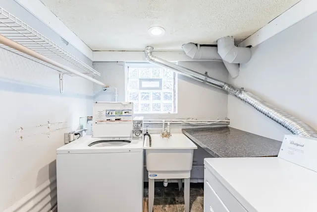 a backyard of a house with seating space