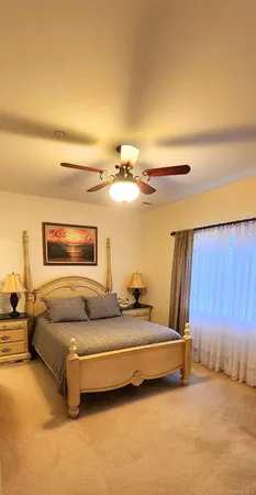 a bed room with a bed and a couch