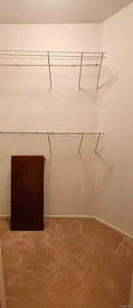 a view of a room with racks on the wall