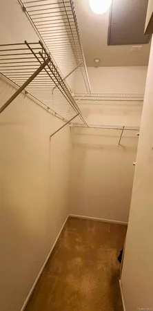 a view of a room with racks on the wall