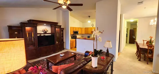 a kitchen with a stove a sink and a refrigerator
