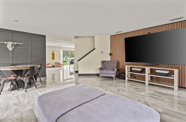 a utility room with sink dryer and washer
