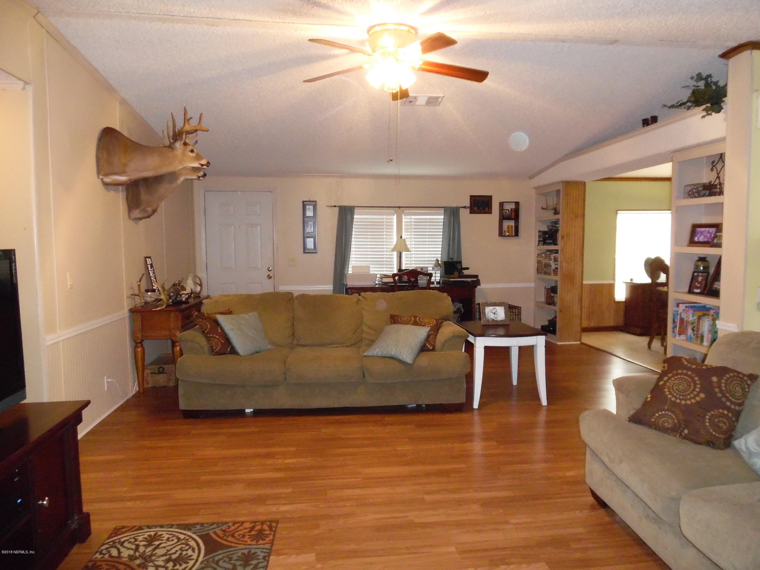 6393 Woodlawn Road Macclenny, FL 32063 - Photo 3 of 21 SPACIOUS FAMILY ROOM