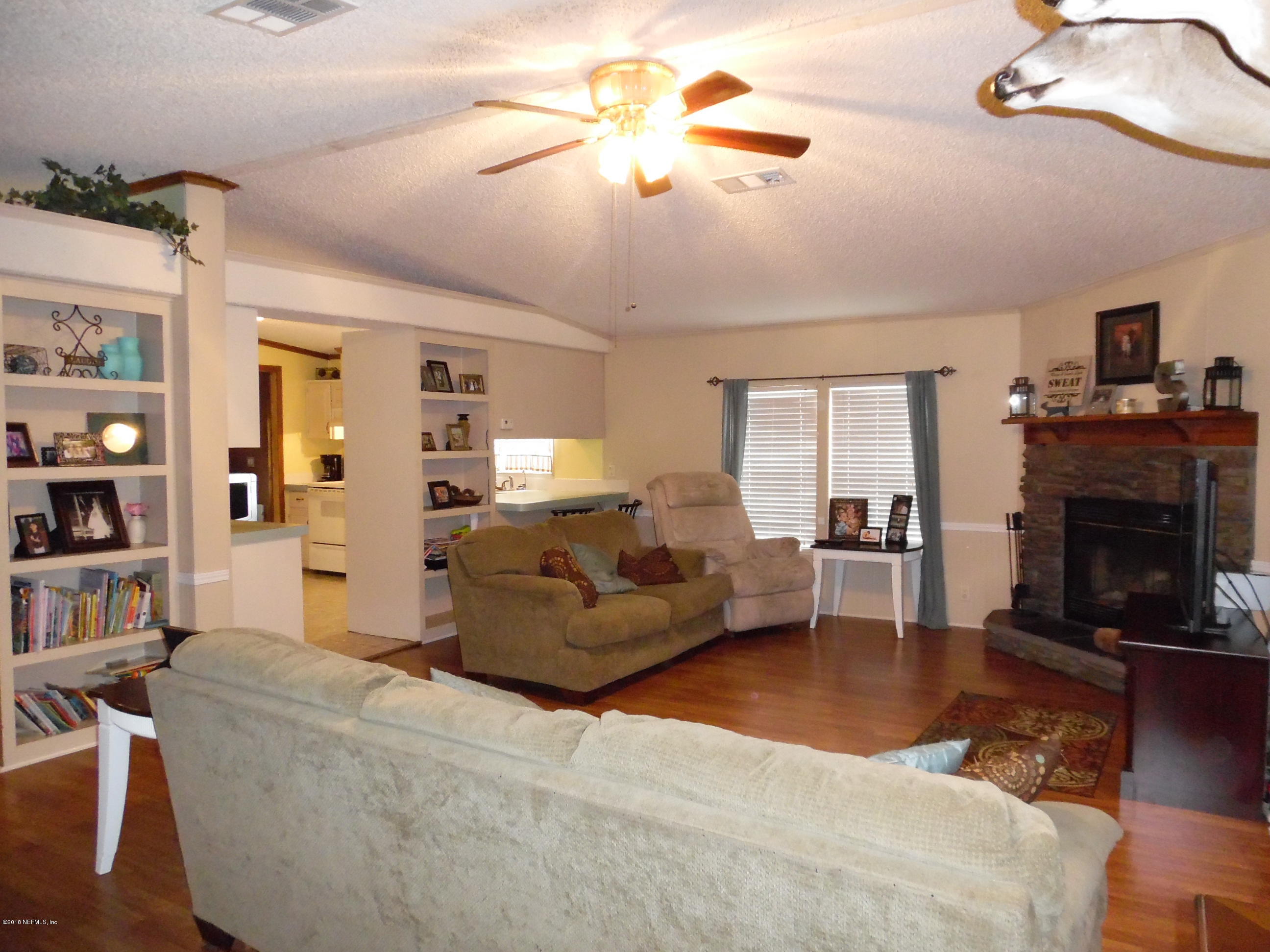6393 Woodlawn Road Macclenny, FL 32063 - Photo 6 of 21 BUILT IN BOOKSHELVES