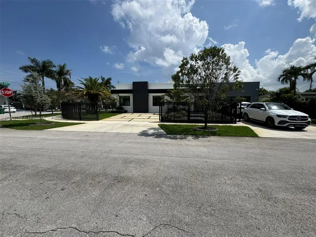 a view of street with parked cars