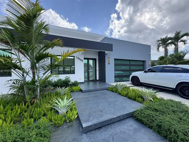 a view of a couches in patio of a house