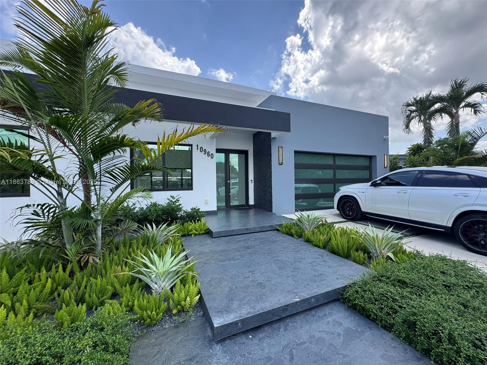 10960 Southwest 42nd Terrace Miami, FL 33165 - Photo 10 of 38 a view of a couches in patio of a house