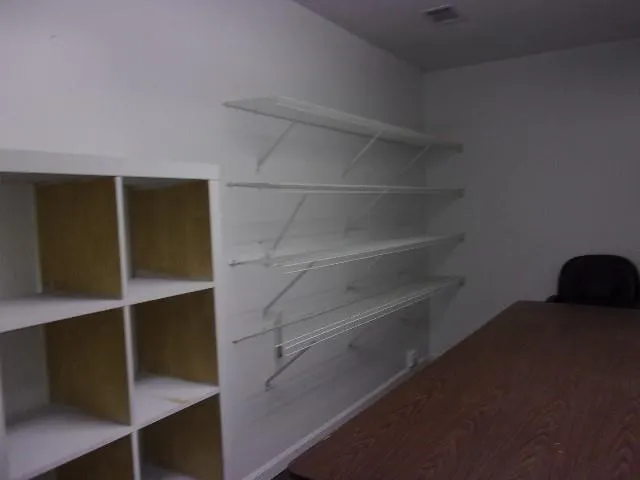 a living room with a closet