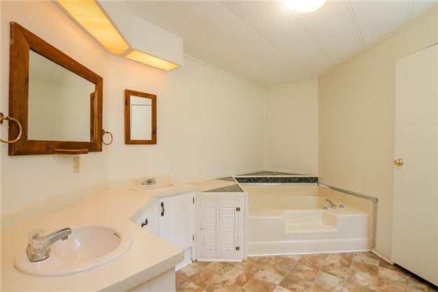 6291 Ladd Road Franklin, TN 37067 - Photo 18 of 20 Large master bath with double sinks, separate soaking tub and separate shower stall plus plenty of closet space.
