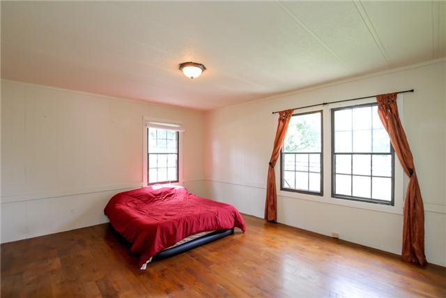 6291 Ladd Road Franklin, TN 37067 - Photo 19 of 20 Large master bedroom with wood floors.