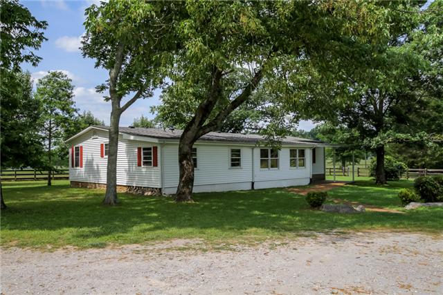 6291 Ladd Road Franklin, TN 37067 - Photo 8 of 20 View of the back of this house. Live here and rent out the horse barn and property, or use the horse barn and rent out the house, or remove the house and Build Your Dream House!