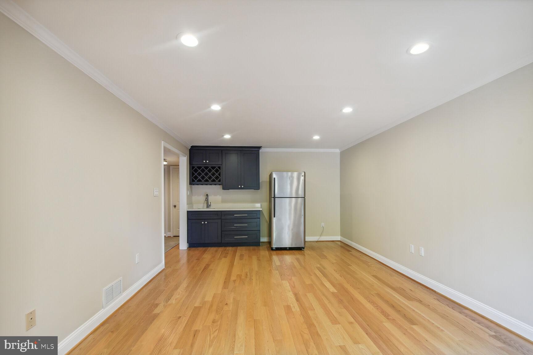7333 Eldorado Street McLean, VA 22102 - Photo 15 of 24 Basement Wet Bar Living Room