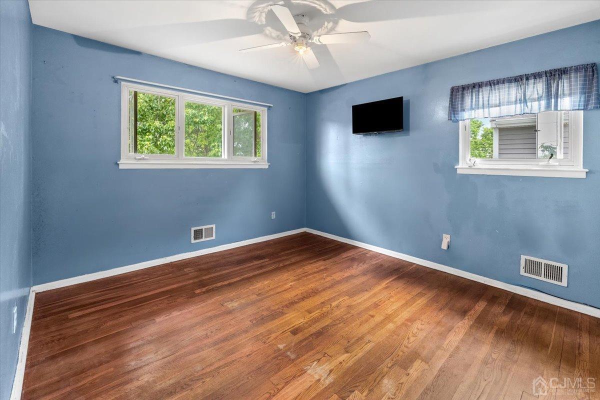 15 Drake Road Somerset, NJ 08873 - Photo 13 of 27 a view of room with window and ceiling fan