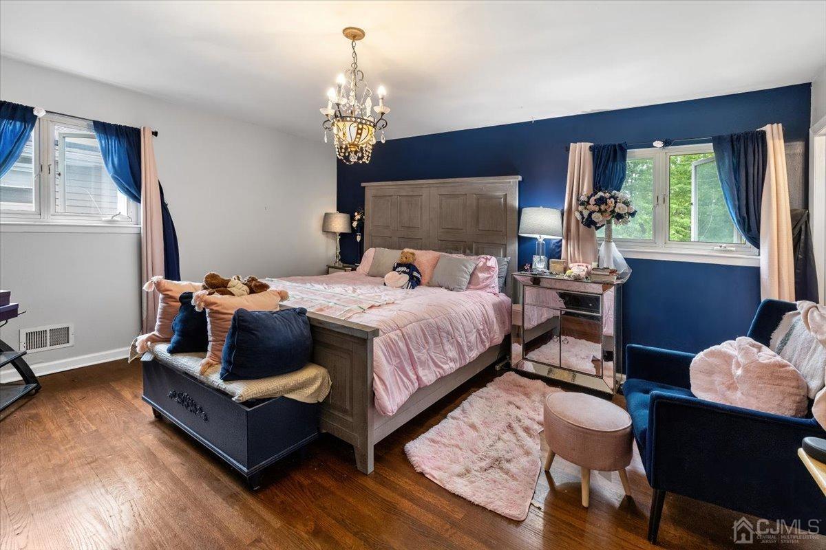 15 Drake Road Somerset, NJ 08873 - Photo 16 of 27 a bed room with a bed window and a chair