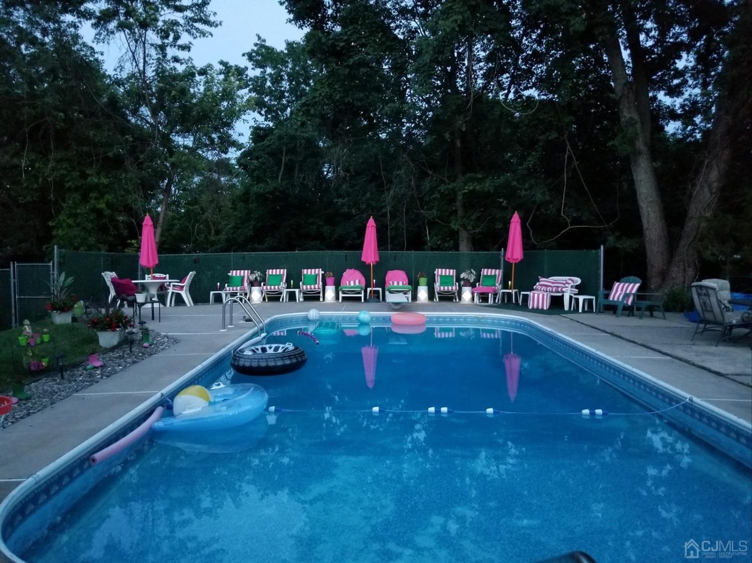15 Drake Road Somerset, NJ 08873 - Photo 22 of 27 a view of swimming pool with sitting area