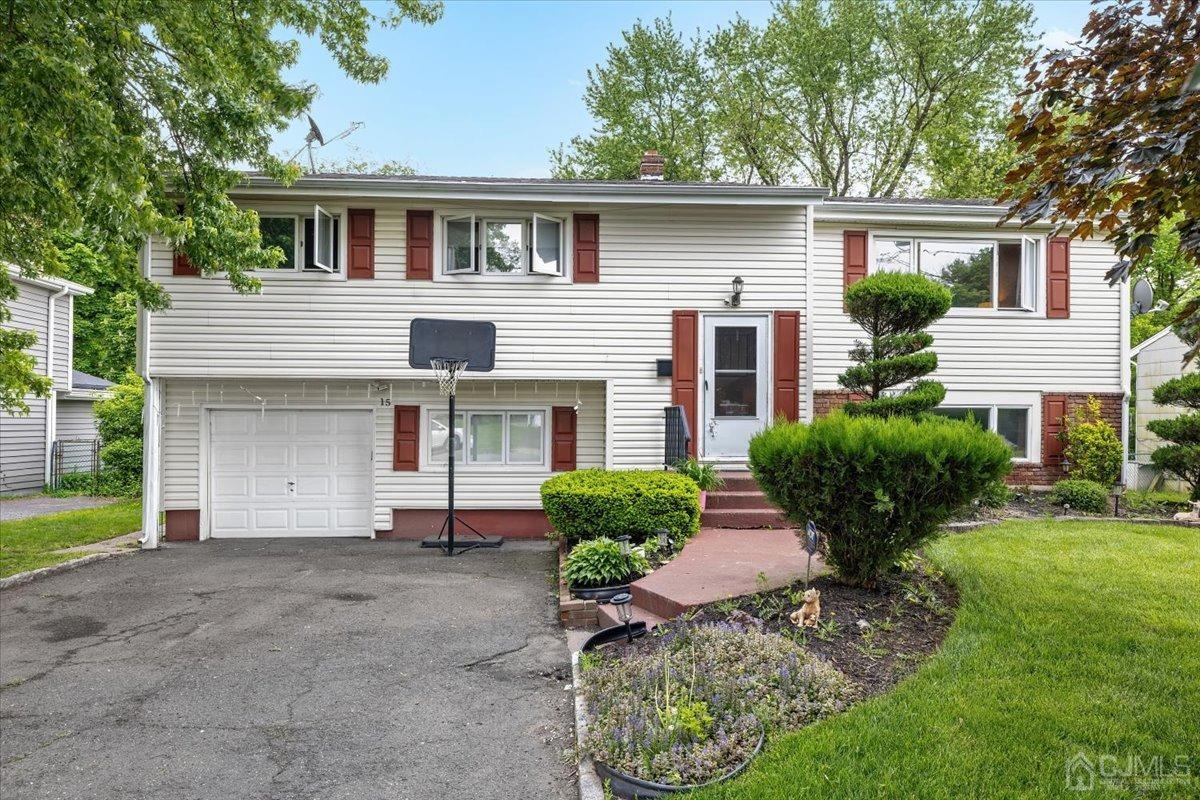 15 Drake Road Somerset, NJ 08873 - Photo 3 of 27 front view of a house with a yard