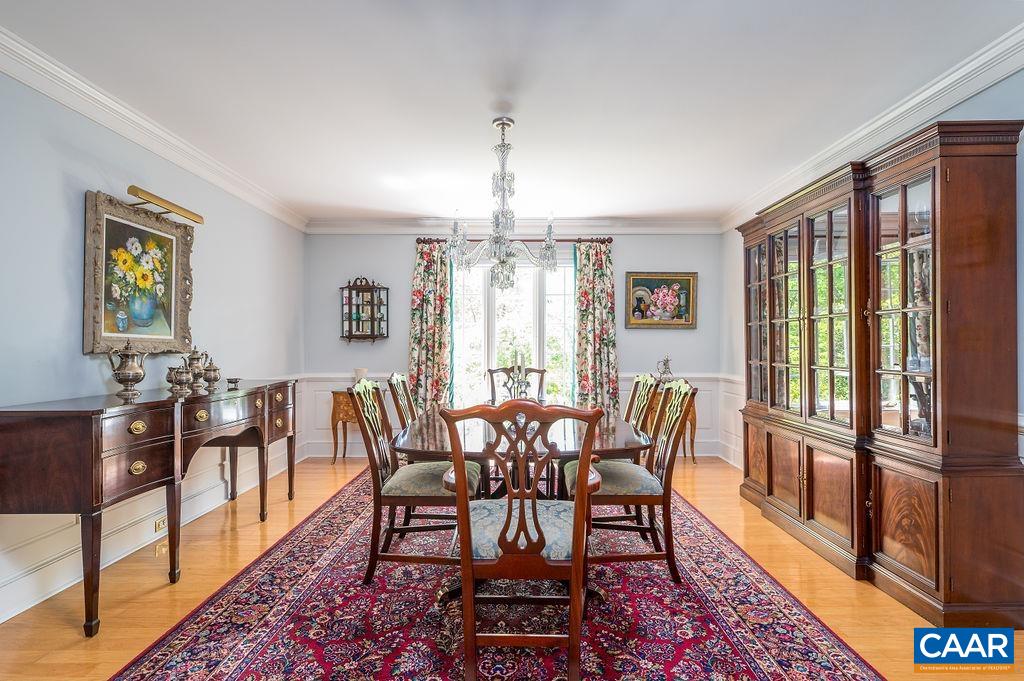960 Windsor Road Charlottesville, VA 22901 - Photo 13 of 51 a view of a dining room with furniture window and wooden floor