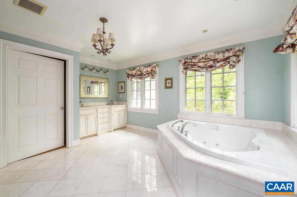 960 Windsor Road Charlottesville, VA 22901 - Photo 24 of 51 a spacious bathroom with a bathtub and a shower
