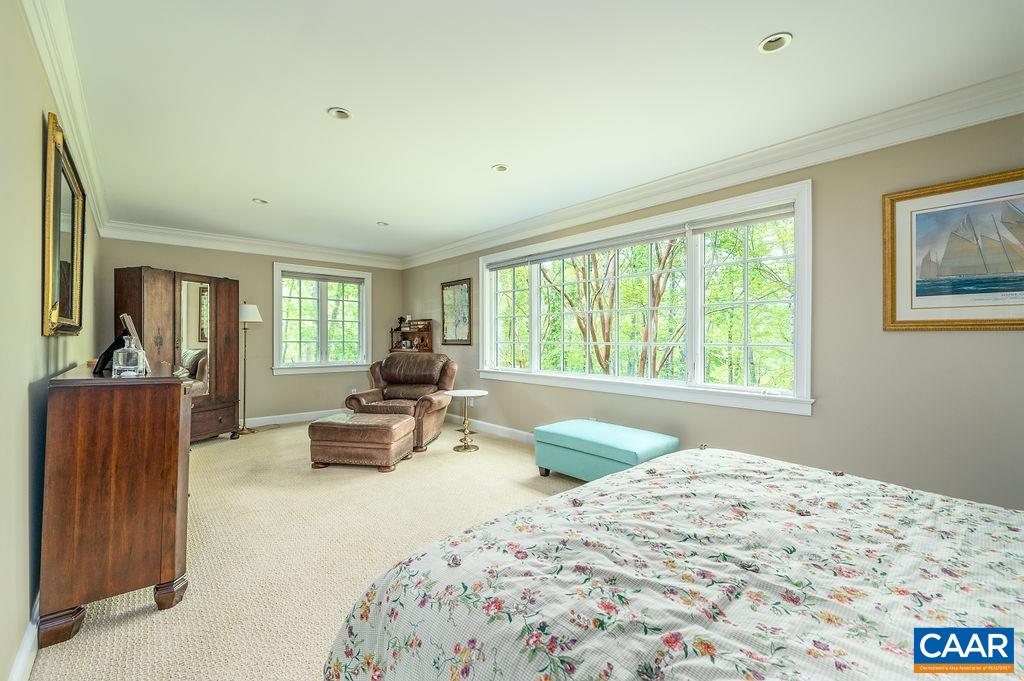 960 Windsor Road Charlottesville, VA 22901 - Photo 32 of 51 a bedroom with a bed and large windows