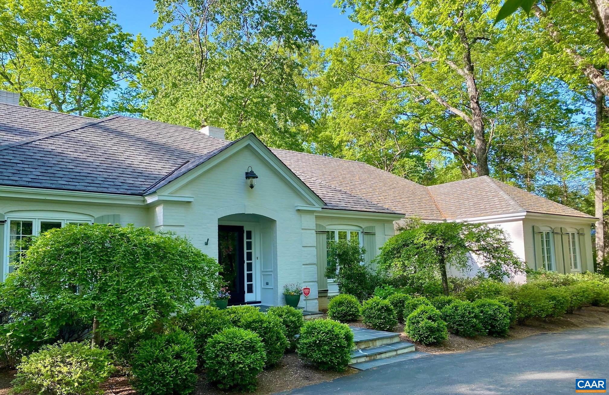 960 Windsor Road Charlottesville, VA 22901 - Photo 4 of 51 a front view of a house with garden