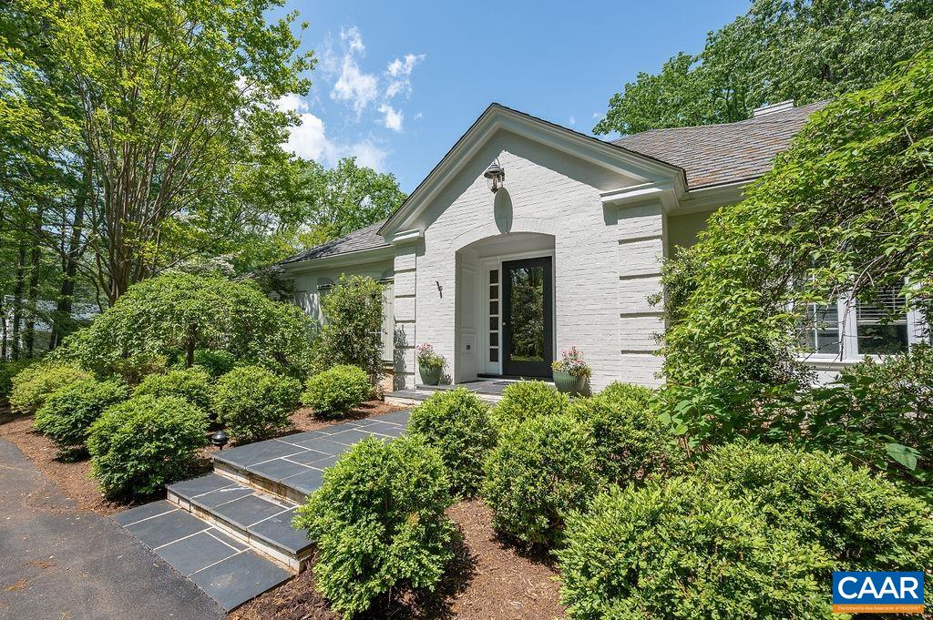 960 Windsor Road Charlottesville, VA 22901 - Photo 6 of 51 a view of a house with a yard and potted plants