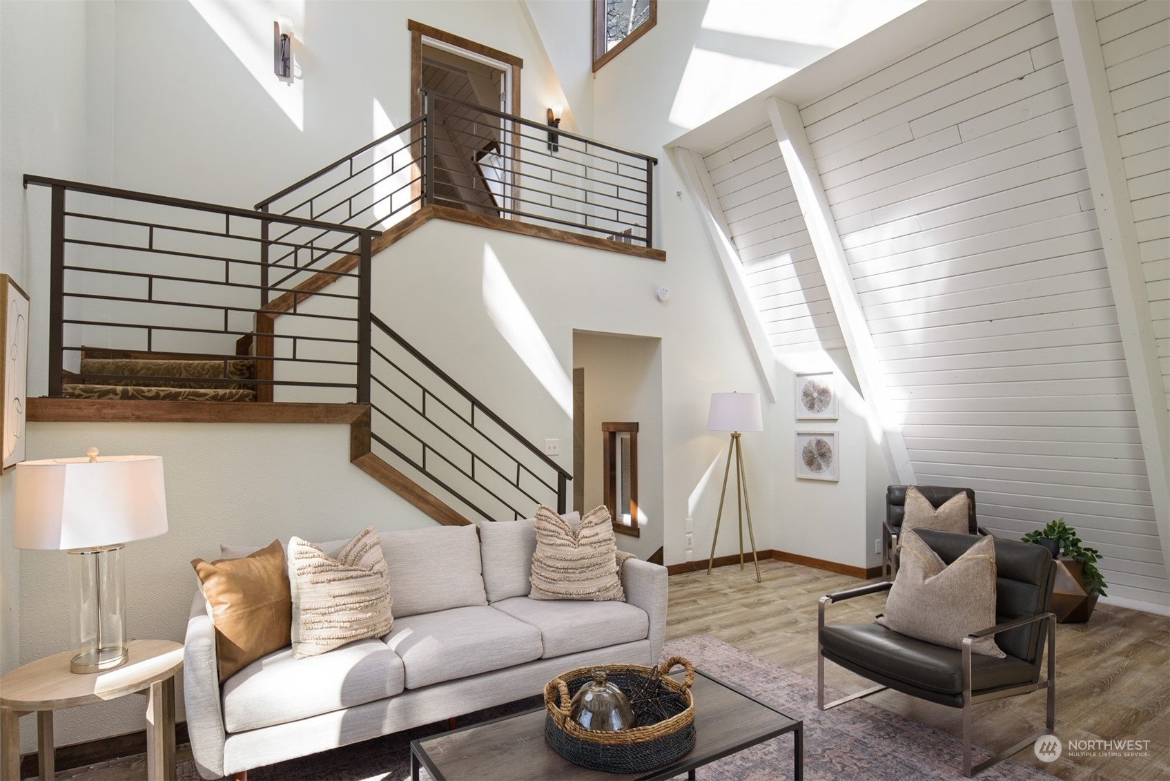 17548 Southeast 110th Street Renton, WA 98059 - Photo 19 of 37 a living room with furniture and a painting