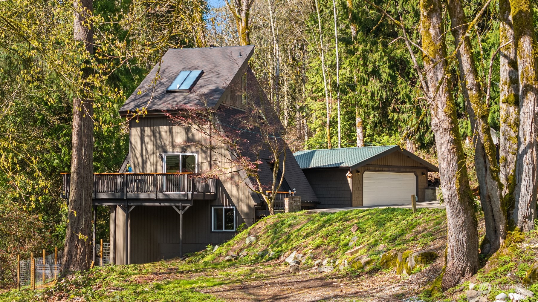 17548 Southeast 110th Street Renton, WA 98059 - Photo 2 of 37 a front view of a house with a garden