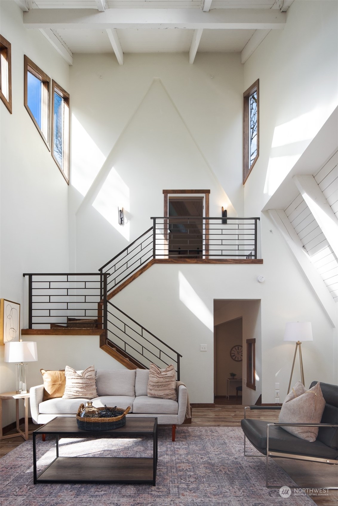 17548 Southeast 110th Street Renton, WA 98059 - Photo 21 of 37 a living room with furniture and a fireplace