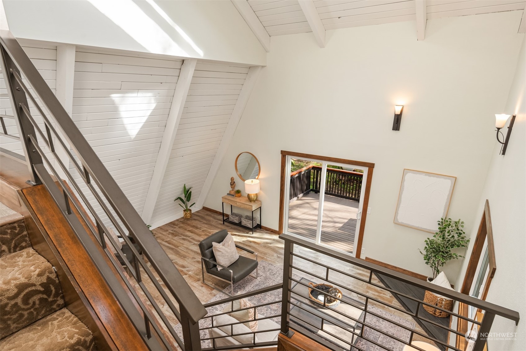 17548 Southeast 110th Street Renton, WA 98059 - Photo 22 of 37 a view of a living room with furniture and a floor to ceiling window
