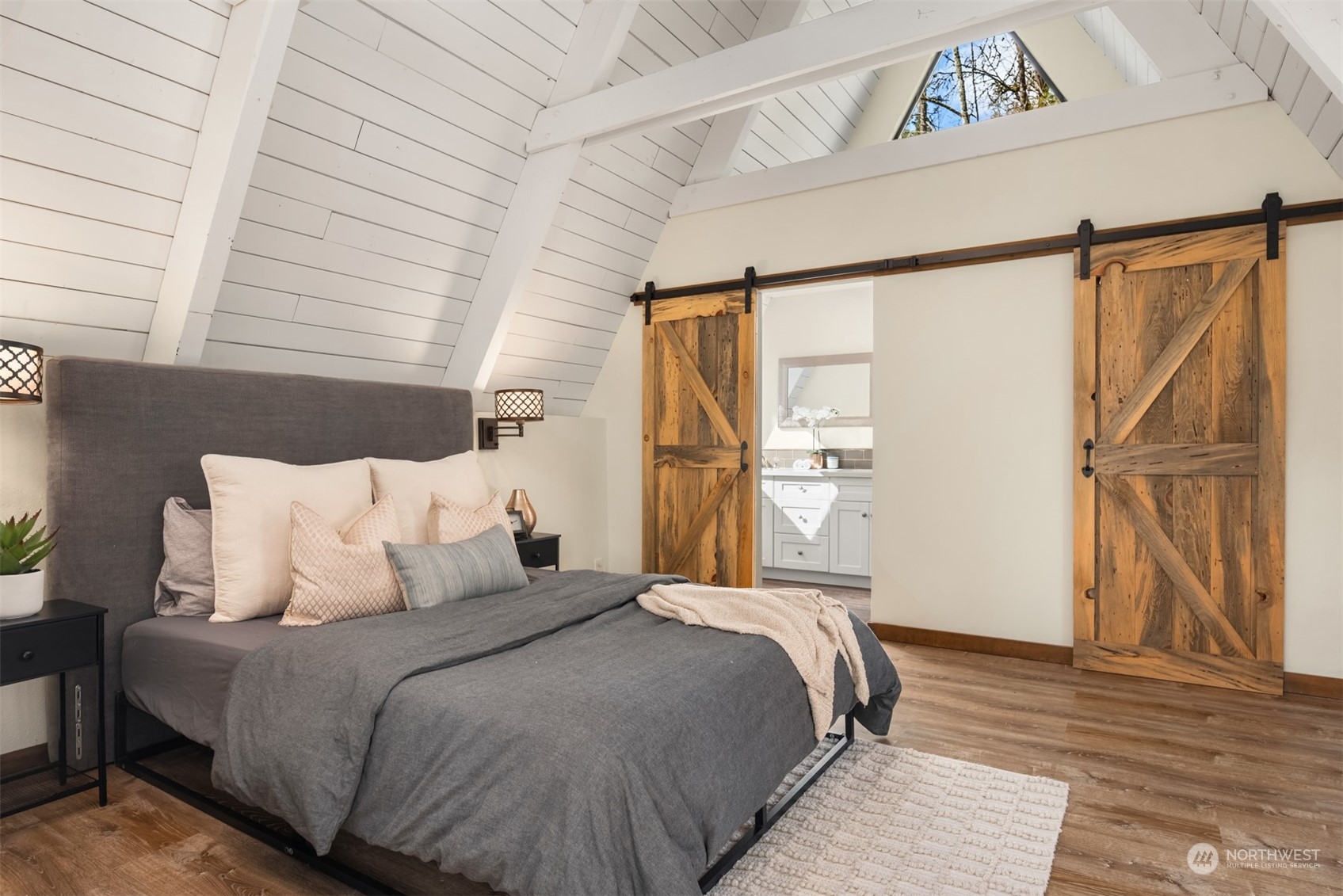 17548 Southeast 110th Street Renton, WA 98059 - Photo 23 of 37 a bedroom with a bed and a window