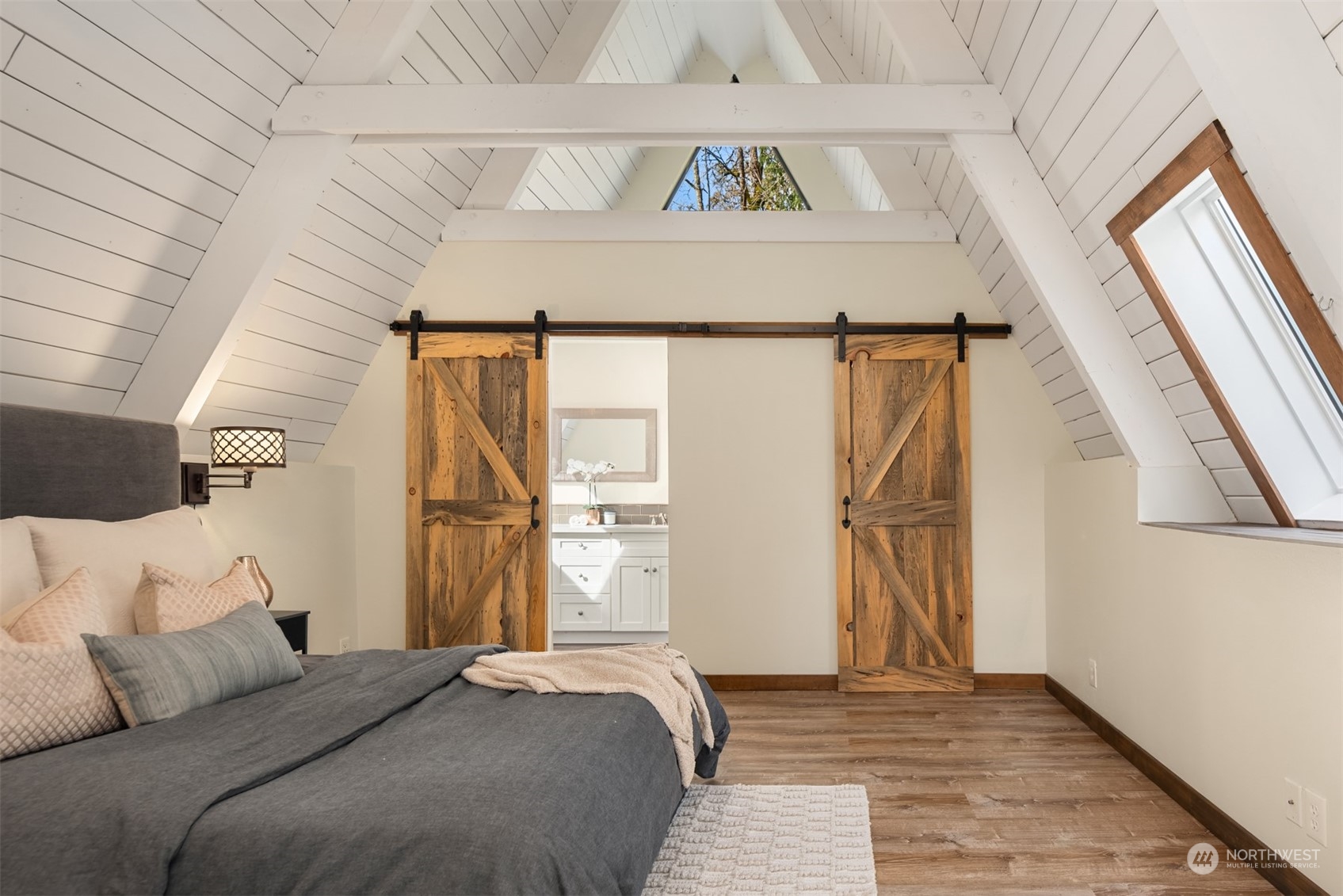 17548 Southeast 110th Street Renton, WA 98059 - Photo 24 of 37 a bedroom with a bed and a window