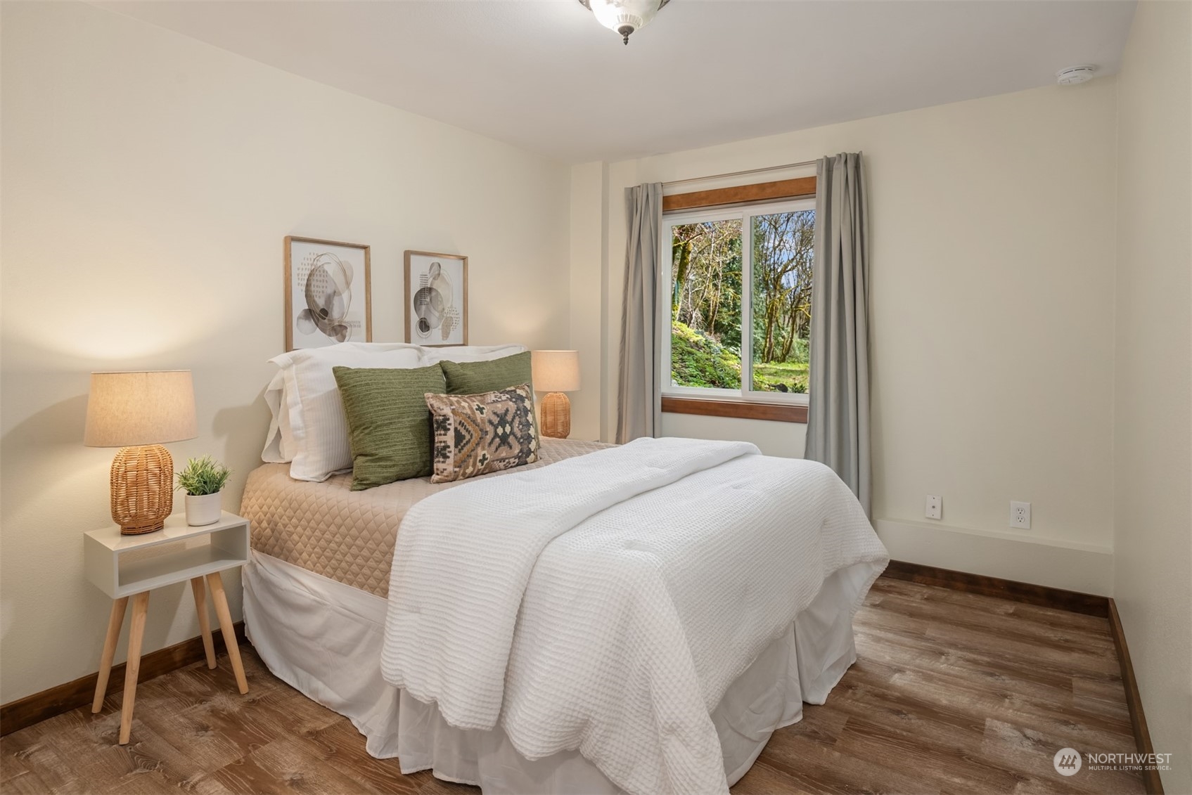 17548 Southeast 110th Street Renton, WA 98059 - Photo 26 of 37 a bedroom with a bed and window