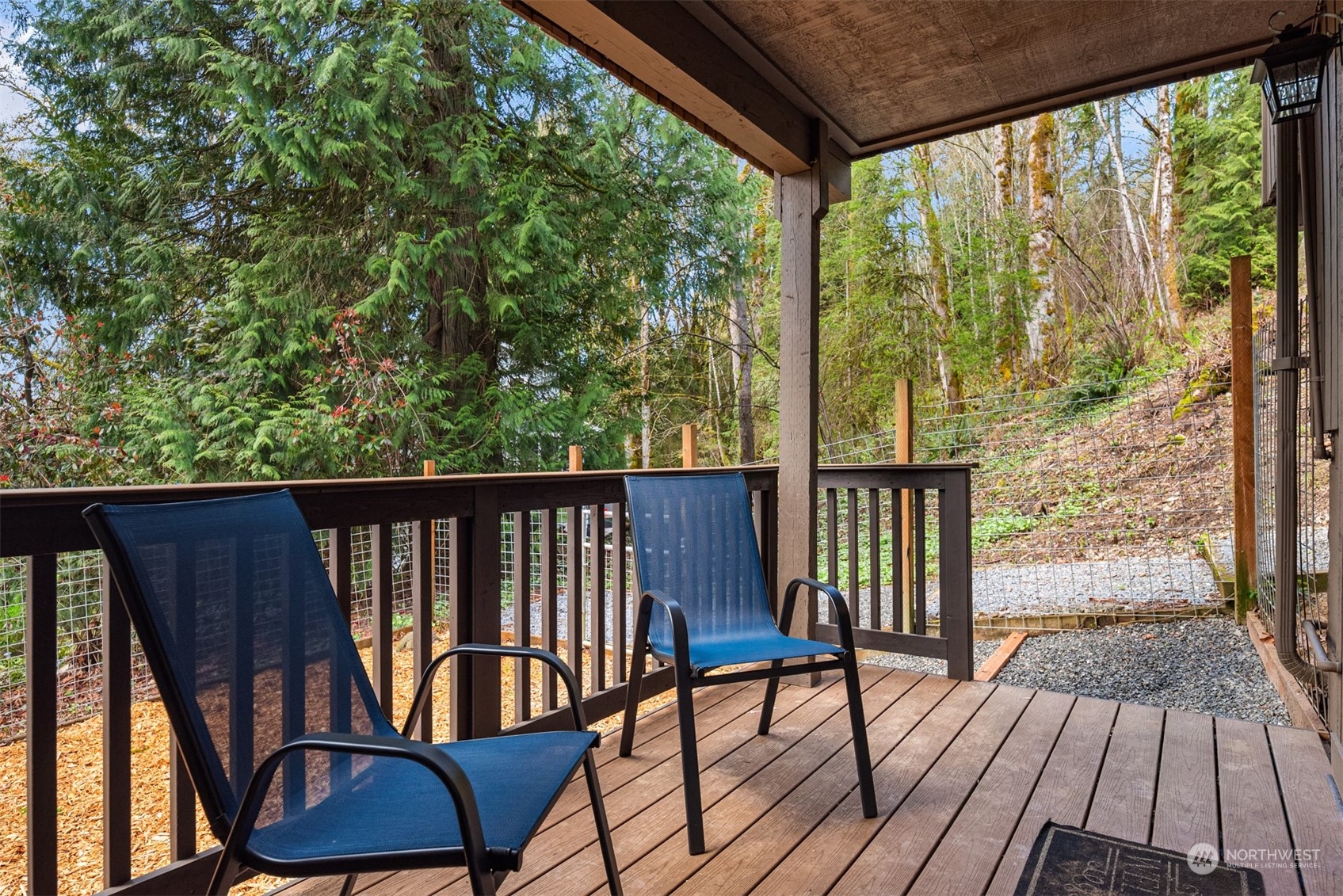17548 Southeast 110th Street Renton, WA 98059 - Photo 33 of 37 a view of balcony with furniture and wooden floor
